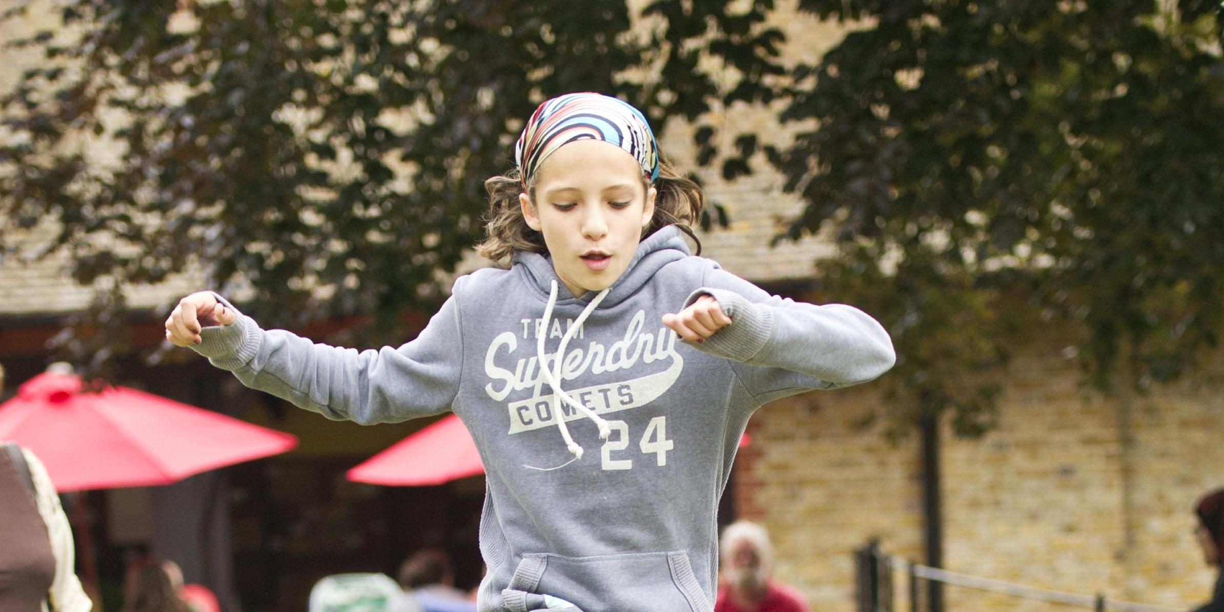 Child doing standing long jump